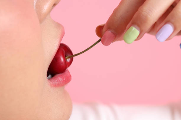 istock Woman with Fruit 1700668456
