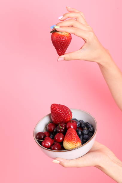 istock Woman with Fruit 1700668470