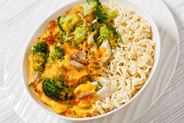 istock ramen noodle with chicken, broccoli and cheese 1700674662