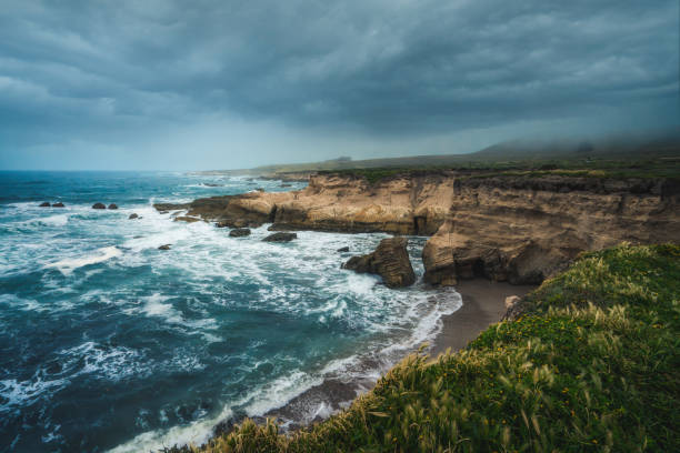 istock Rocky cliffs by the ocean, view from bluffs, beautiful dramatic seascape, Montana de Oro State Park, CA 1700677686