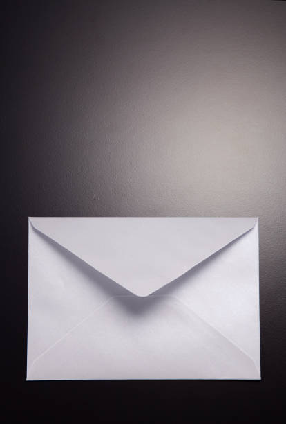 istock back view  of white envelope against a gray background 1700696013