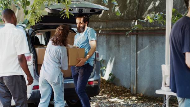 istock Less Fortunate People Receive Donations 1700715782