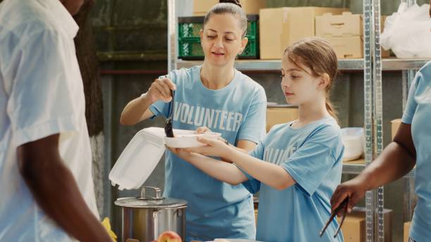 istock Young Volunteers Aid Those In Need 1700718338