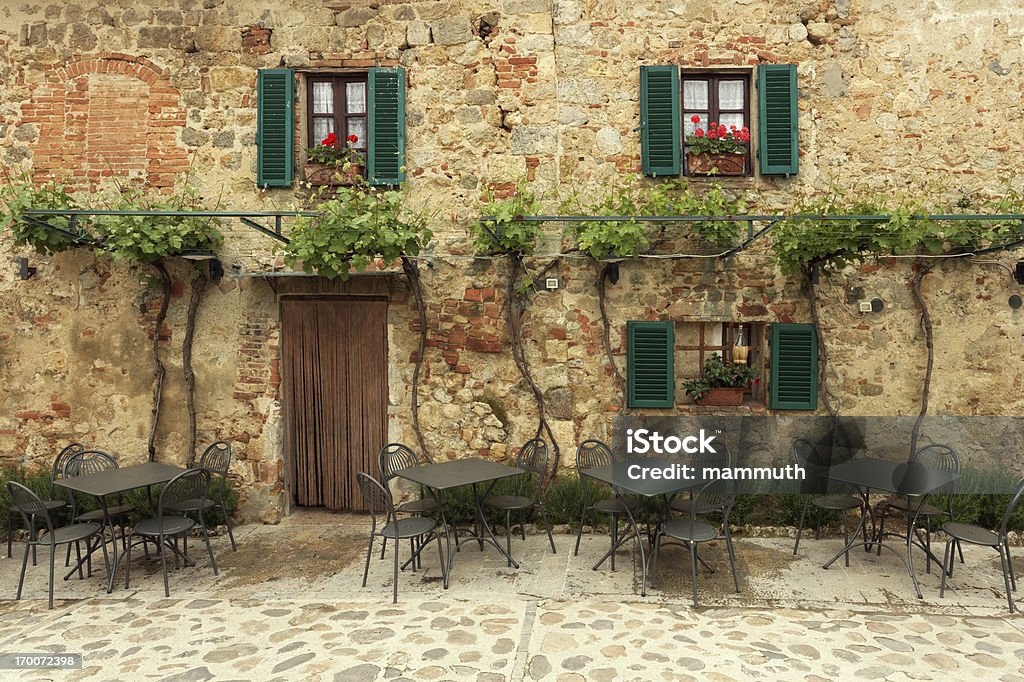 Restaurant tables in Italy Restaurant tables in Tuscany, Italy (shot in Monteriggioni) Italy Stock Photo