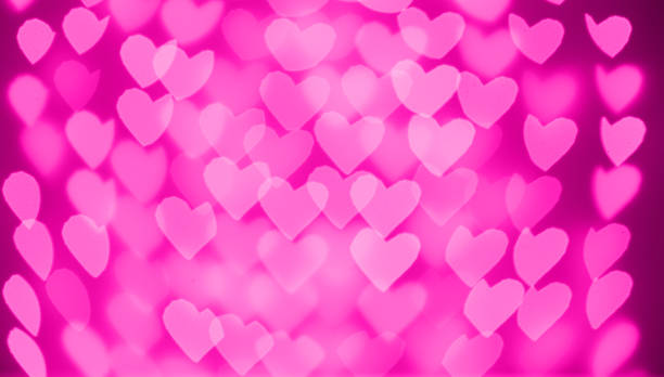 istock beautiful hearts made of lights on a blurred background 1700724044