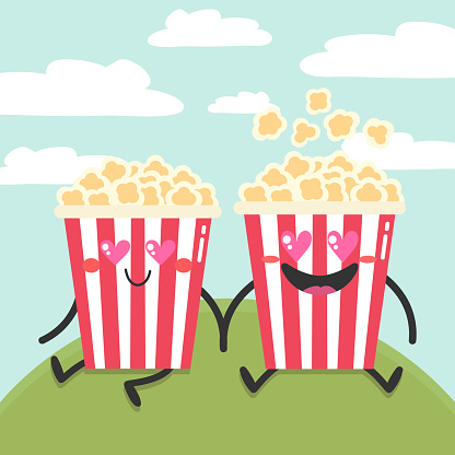 Two cute cartoon popcorn characters in love. Two popcorn buckets are sitting on the grass with heart shaped eyes. Flat style. Vector illustration