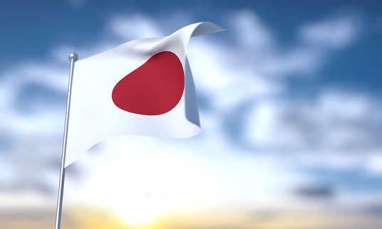 Japanese Flag On Blue Sky With Copy Space