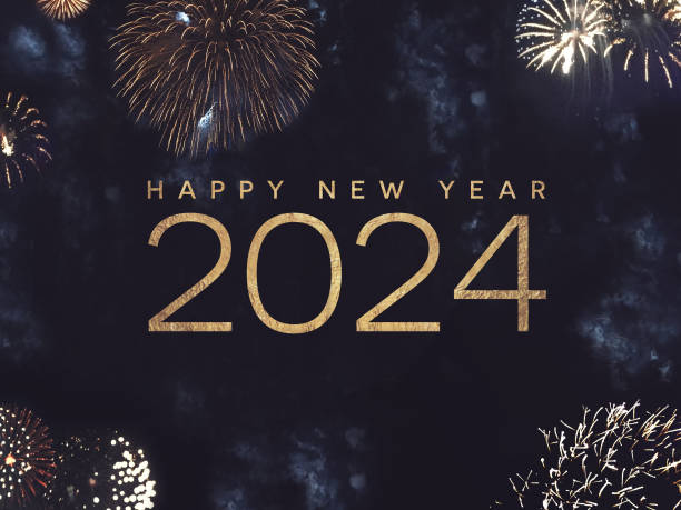istock Happy New Year 2024 Text Holiday Graphic with Gold Fireworks Background in Night Sky 1700778321