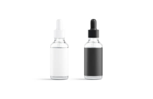 istock Blank glass dropper bottle with white and black label mockup 1700783812