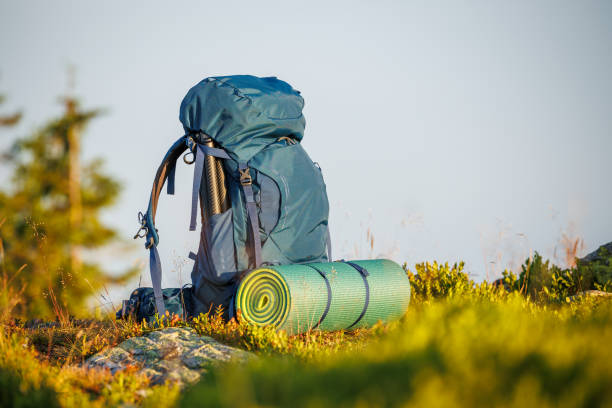 istock Hiking backpack with mat during trek in mountain 1700784244