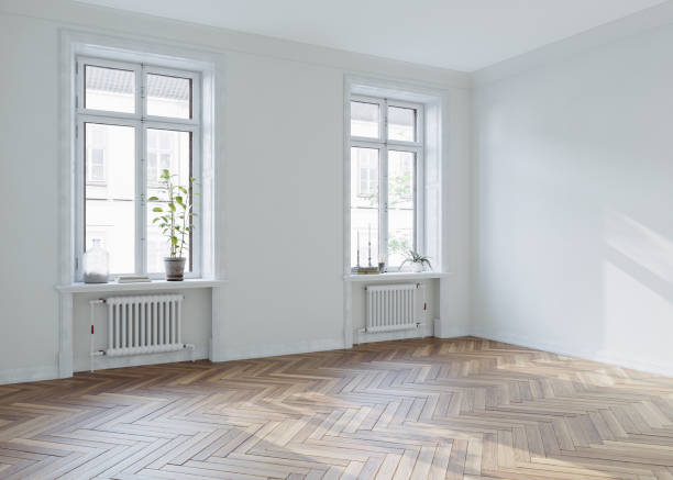 istock Empty living room interior design with windows, white walls and hardwood flooring, 3d rendering 1700816826