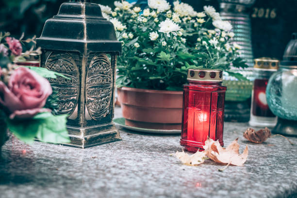istock All Saints day, red burning candle 1700829028