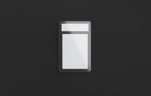istock Blank transparent plastic trading card mockup, dark background 1700832350