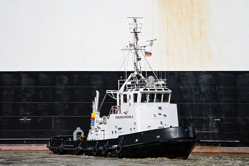 Emden, Germany - August 31, 2023: ESB tugboat ‘Friedrich Wessels’ in the port of Emden