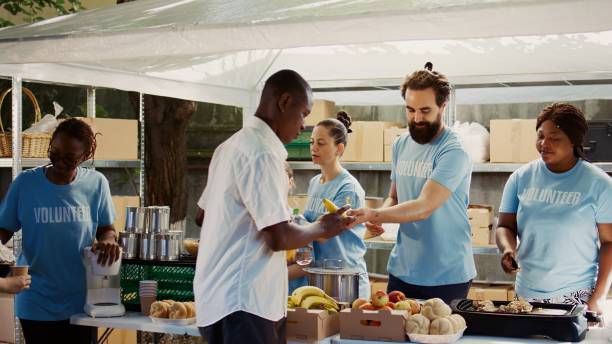 istock Hunger Relief Team Distributes Free Food 1700838097