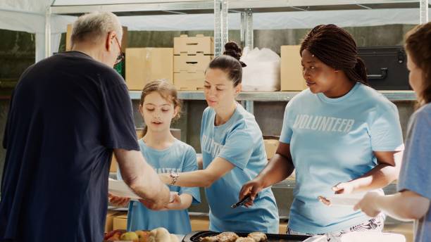 istock Community Assistance In Feeding The Poor 1700848544