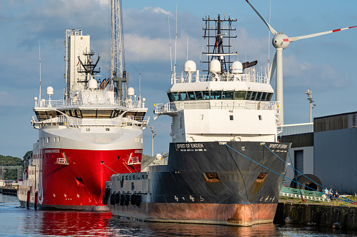 Emden, Germany - September 1, 2023: offshore vessels ‘Spirit of Emden’ and ‘Norwind Breeze’ in the port of Emden
