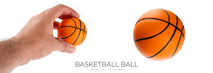 Basketball ball in hand isolated on white background. High quality photo