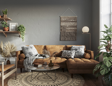 Dark scandinavian interior of the living room with gray walls, cozy furniture, leather sofa, armchair, hardwood flooring. Mockup concept