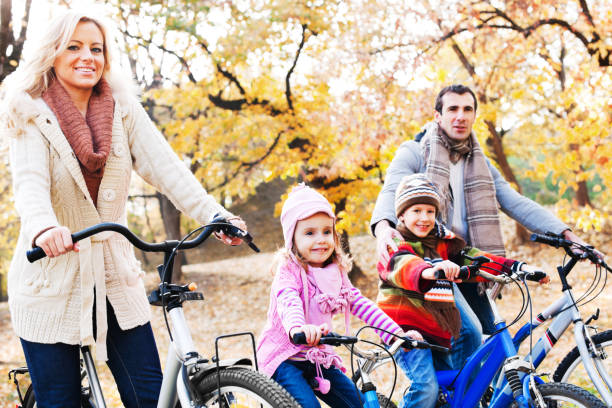 istock Happy family riding bicycles in nature. 170088542