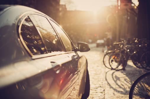 Parking car in the sunlight, Very shallow depth of field shot against the sun, minimal chromatic aberrations