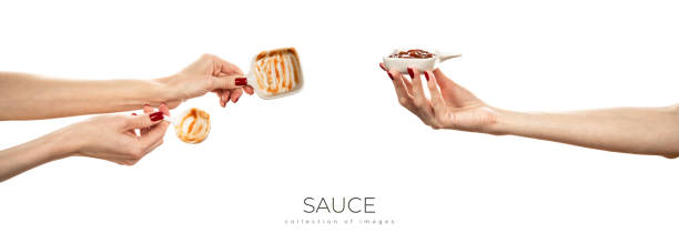 istock Bowl with red sauce isolated on white background 1700905804