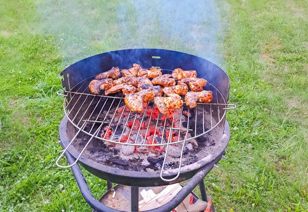 istock Grilled kebab cooking. Roasted meat cooked at barbecue 1700906354