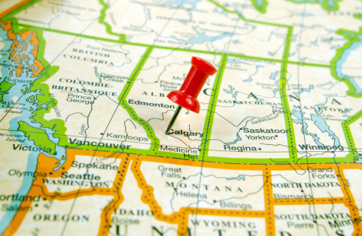 A map of Western Canada with a red stick pin in indicating Calgary. Map by MapArt.