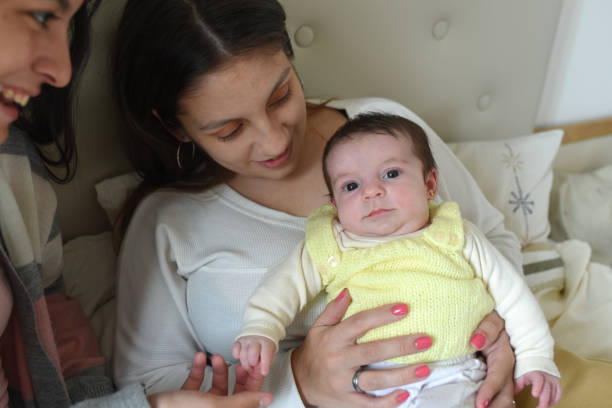 istock women with baby in room 1700924311