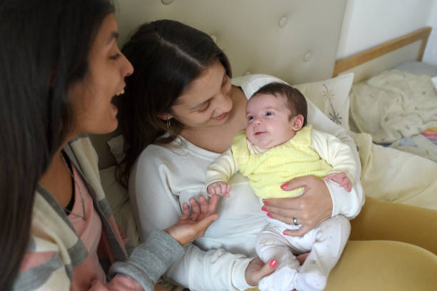 istock women with baby in room 1700924313