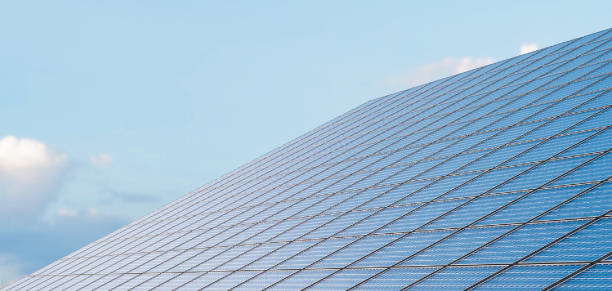istock Photovoltaic power solar plant from drone 1700925904