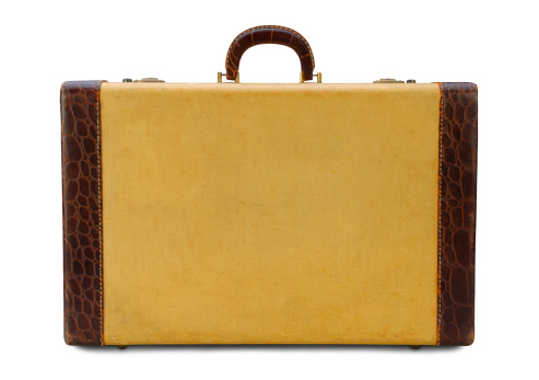Vintage yellow suitcase with faux alligator leather trim. Clipping Path Included.