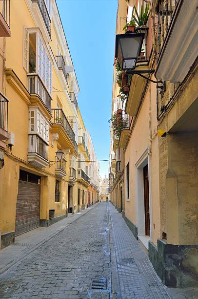Just what it says, a residential street in the old town portion of Cadiz with the cobblestone pavement, oriels, balconies and the required flower pots for decoration
