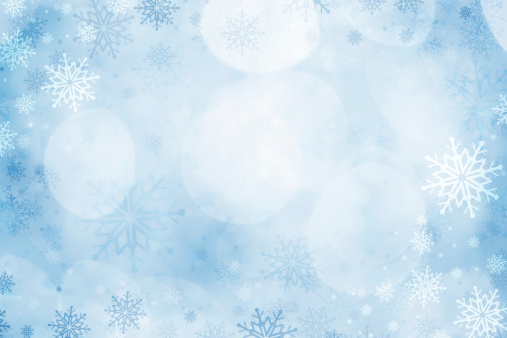 Illustration of a background of white winter snowflakes for christmas and new years eve holidays.