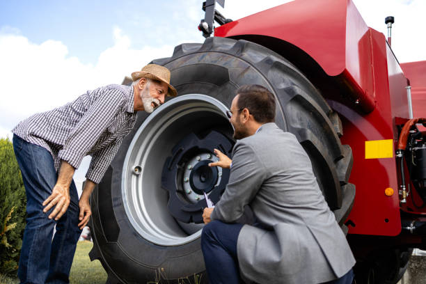 istock Selling agricultural machines. 1700937963