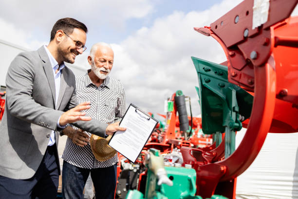 istock Selling agricultural and farming equipment. 1700938504