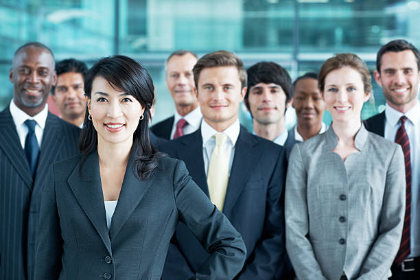 istock Asian woman leading a diverse and dynamic team 170094005