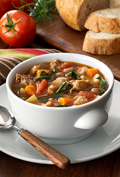 Vegetable soup with sausage stock photo