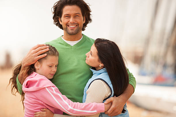 istock Happy family on the beach 170094709