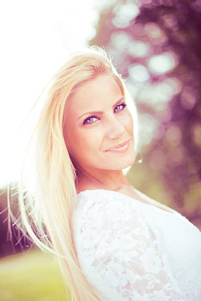 istock Beautiful  woman in park 170094836