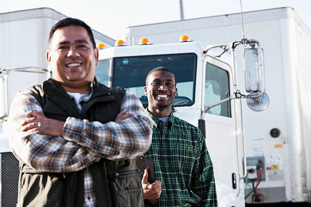 multi-étnica motorista de caminhão - truck driver multi ethnic group industry working class - fotografias e filmes do acervo