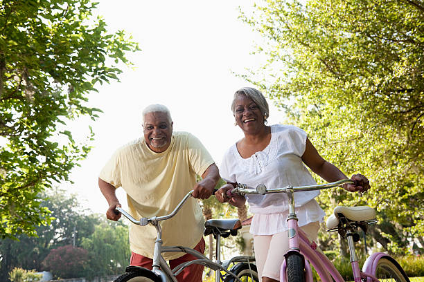 istock Senior African American couple riding bicycles 170096114