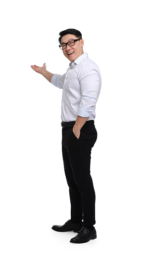 Businessman in formal clothes posing on white background