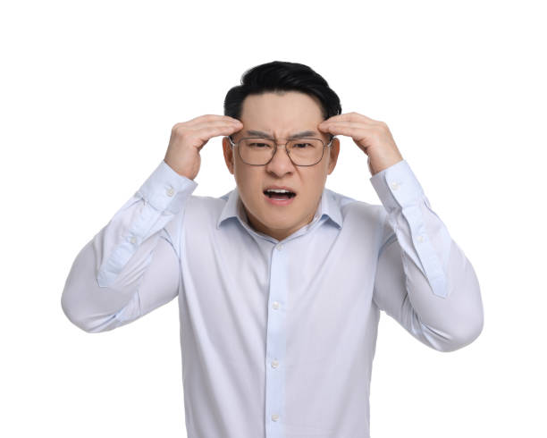 istock Angry businessman in formal clothes screaming on white background 1700977835