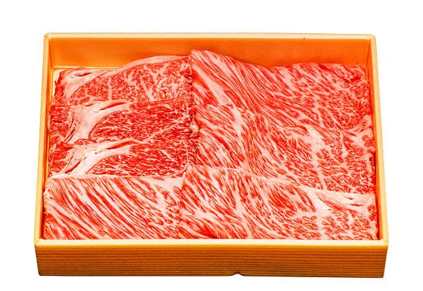 Kobe Beef 500 gramm of high quality Kobe Beef in a typical Japanese home-delivery gift box. Isolated on white. marbled meat stock pictures, royalty-free photos & images