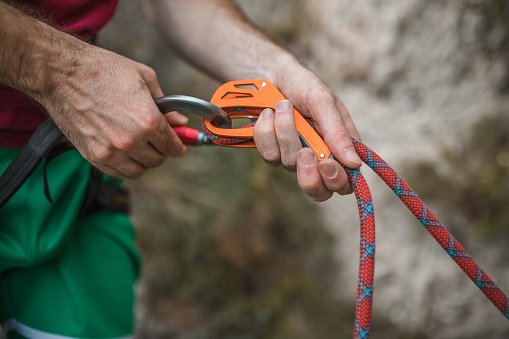 Climbing ropes and carabiner.