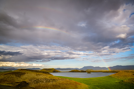 Beautiful rainbow above the Myvatn lake in northern Iceland