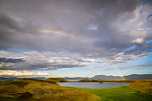 Beautiful rainbow above the Myvatn lake in Iceland