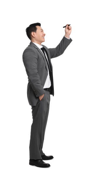 istock Businessman with marker writing on white background 1700991503
