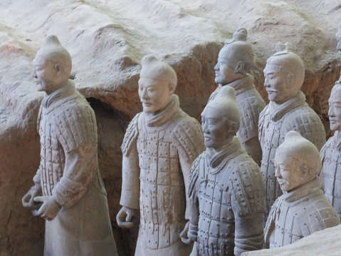 Xi'an, China – February 12, 2023: Shots of the Terracotta Warriors, depicting the armies of Qin Shi Huang, the first emperor of China. The figures stand within pits located at the Emperor Qinshihuang's Mausoleum Site Museum